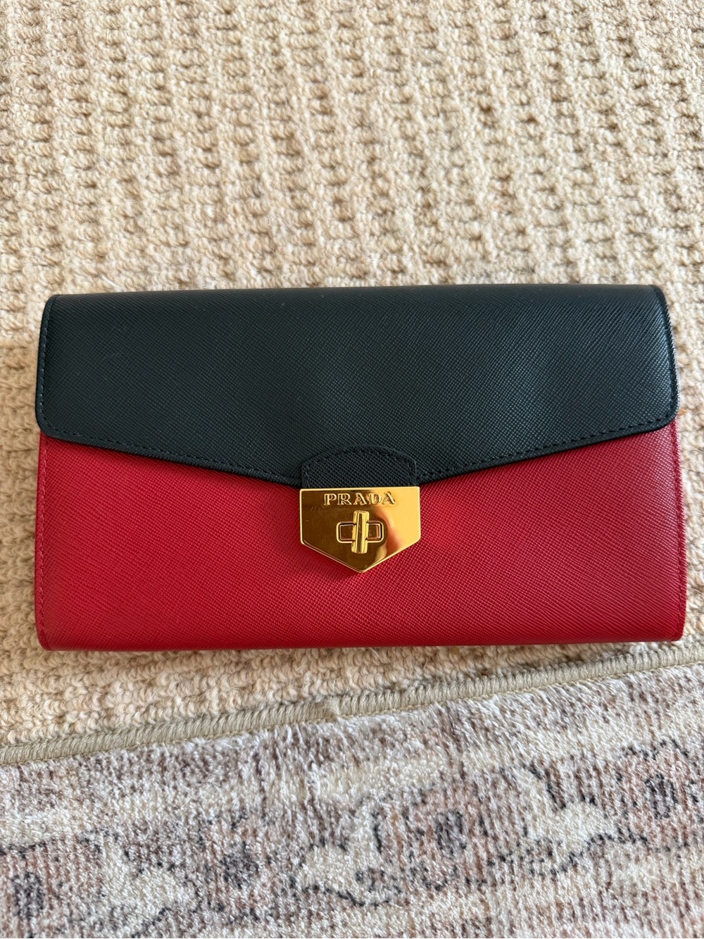 Brand new Authentic Prada Two-Tone Red and Black Saffiano Leather Clutch